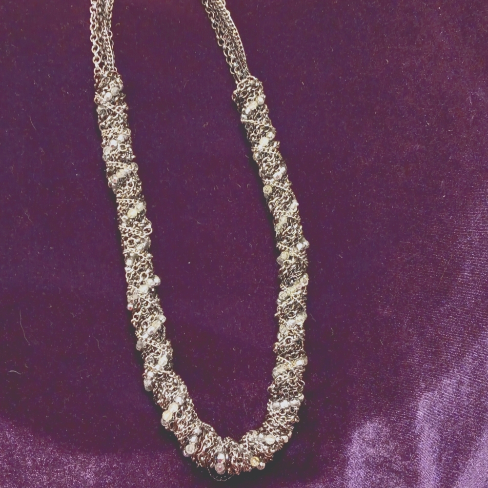 Beautiful twisted glitz chain.  6. Twisted chains. Necklace reflects colors.28in